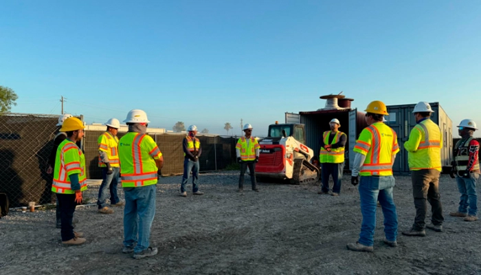 Morning meetings keep the TruGrid crew aligned and ready to take on the day’s work.